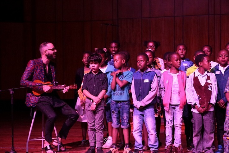 Johannesburg - The celebration was on October 22 nd at the Wits Linder Auditorium, with about 750 guests in
	attendance, including Baha’is and their friends. The MEC for Social Development, Ms Khosa also
	attended. Guest were welcomed by a marimba band. The actual programme included songs by 40
	children, and the Johannesburg Baha’i choir. Prayers were also shared and the film, “Light to the World”
	was viewed. Guests were also treated to a gumboot dance by participants of a junior youth group.