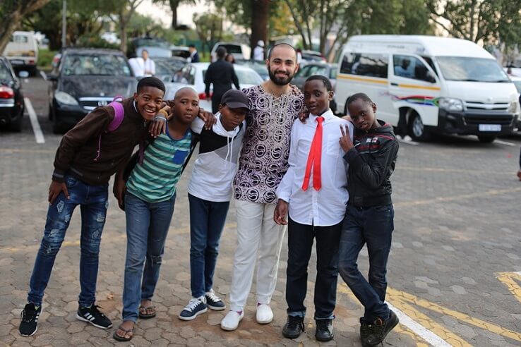 Johannesburg - The celebration was on October 22 nd at the Wits Linder Auditorium, with about 750 guests in
	attendance, including Baha’is and their friends. The MEC for Social Development, Ms Khosa also
	attended. Guest were welcomed by a marimba band. The actual programme included songs by 40
	children, and the Johannesburg Baha’i choir. Prayers were also shared and the film, “Light to the World”
	was viewed. Guests were also treated to a gumboot dance by participants of a junior youth group.